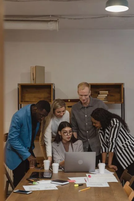 A stylish workspace with a laptop and monitor for social media marketing.